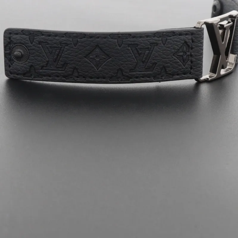 LV engraved metal leather bracelet