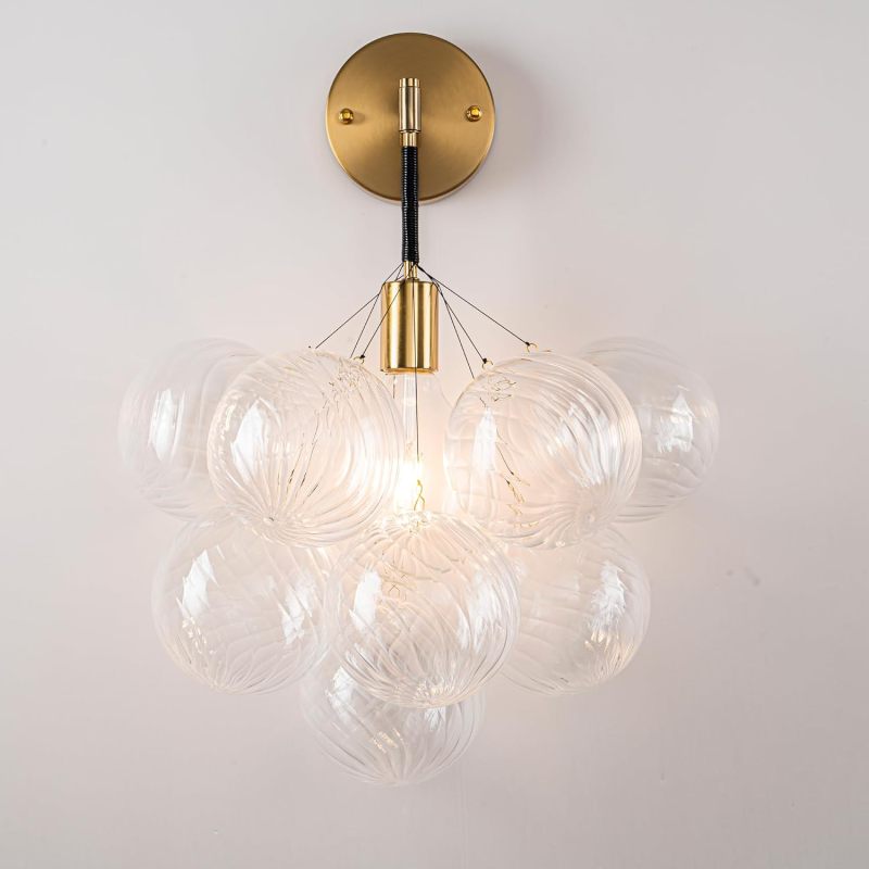 Globe Sconce Black And Gold Finish