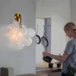 Globe Sconce Black And Gold Finish