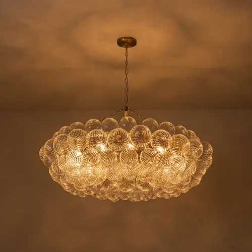 How to design around a large glass bubble chandelier in grand spaces