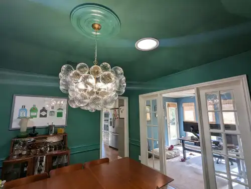 Glass globe light pendant vs. chandeliers for your project