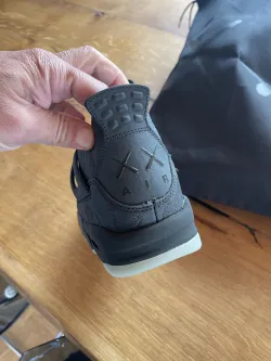 PKGoden Jordan 4 Retro Kaws Black  review Kolokotronis  01