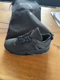 PKGoden Jordan 4 Retro Kaws Black  review 1