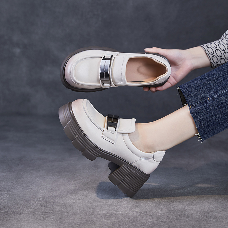 Wearing Genuine Leather Loafers With Thick Heels On One Foot