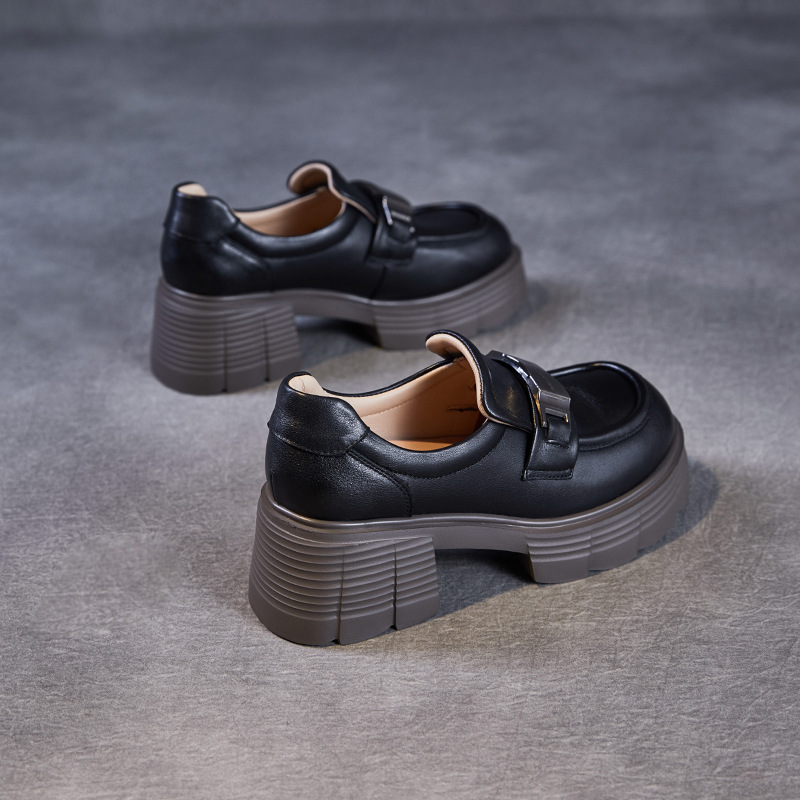 Wearing Genuine Leather Loafers With Thick Heels On One Foot