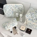 Blue floral quilted makeup bag with large capacity