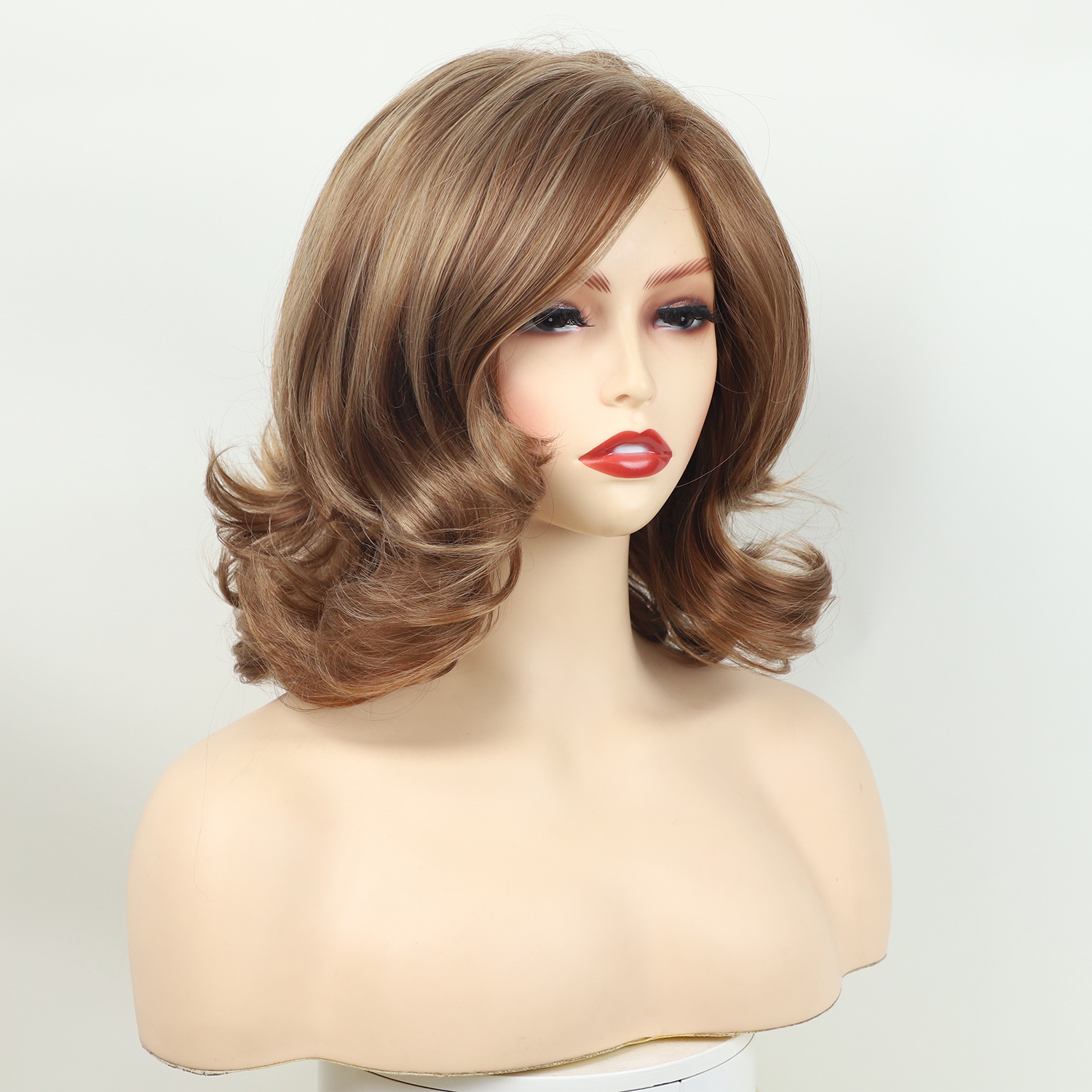 Wig, female, full head, short curly hair, slightly brown in color