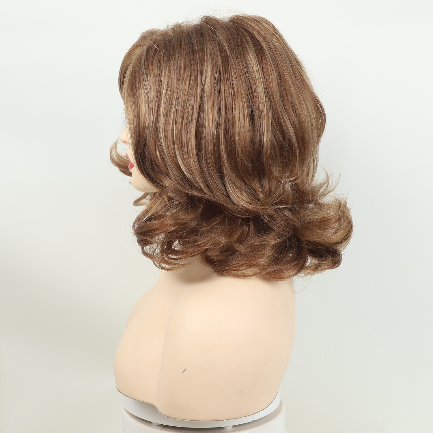 Wig, female, full head, short curly hair, slightly brown in color