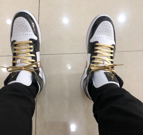 Jordan 1 Mid Patent Black White Gold 852542 007 review 