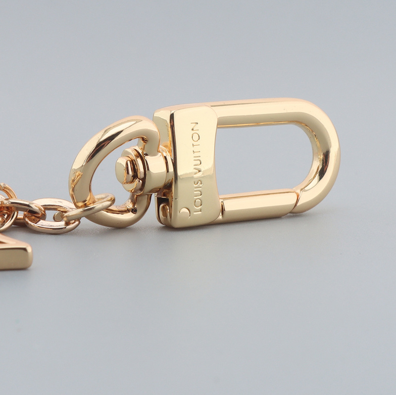 Louis Vuitton Floral logo charm gold