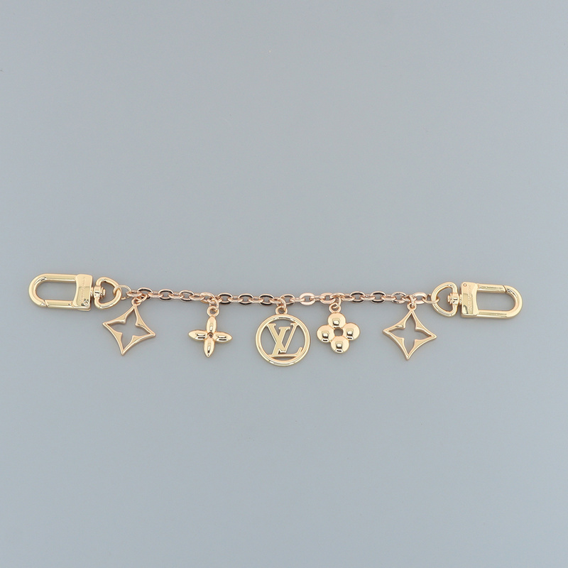 Louis Vuitton Floral logo charm gold