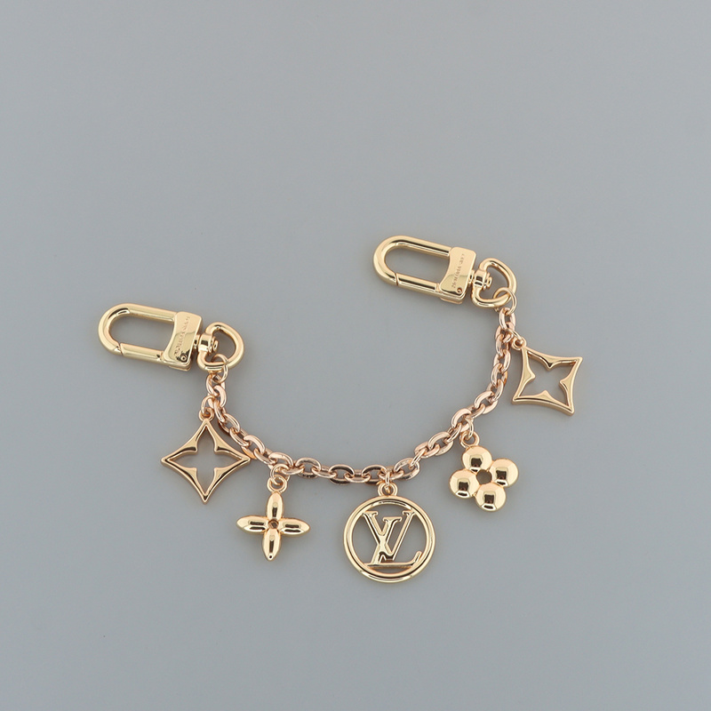 Louis Vuitton Floral logo charm gold