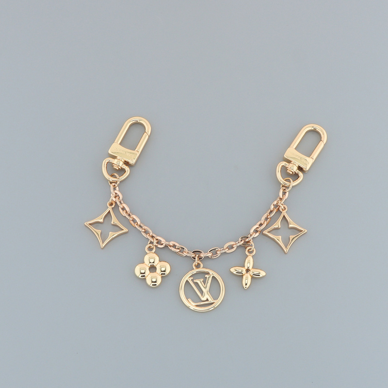 Louis Vuitton Floral logo charm gold