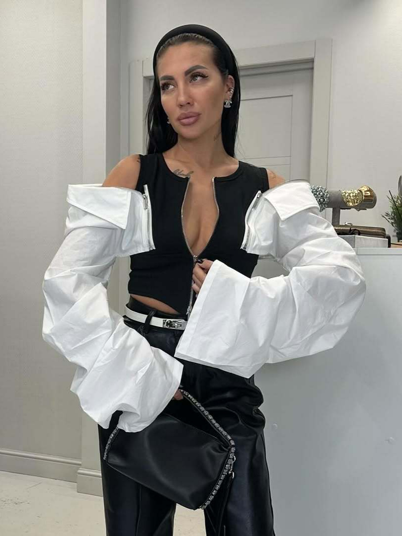 Designsoo Black and White Patchwork Off-Shoulder Crop Top with Oversized Flare Sleeves – Stylish Sleeveless Vest with Statement Sleeves