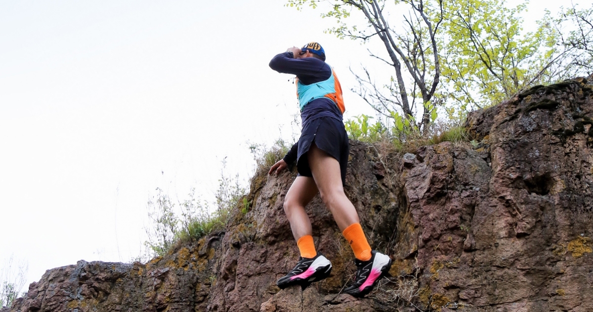 Durable all-terrain trail running shoes featuring shock absorption and anti-slip grip.