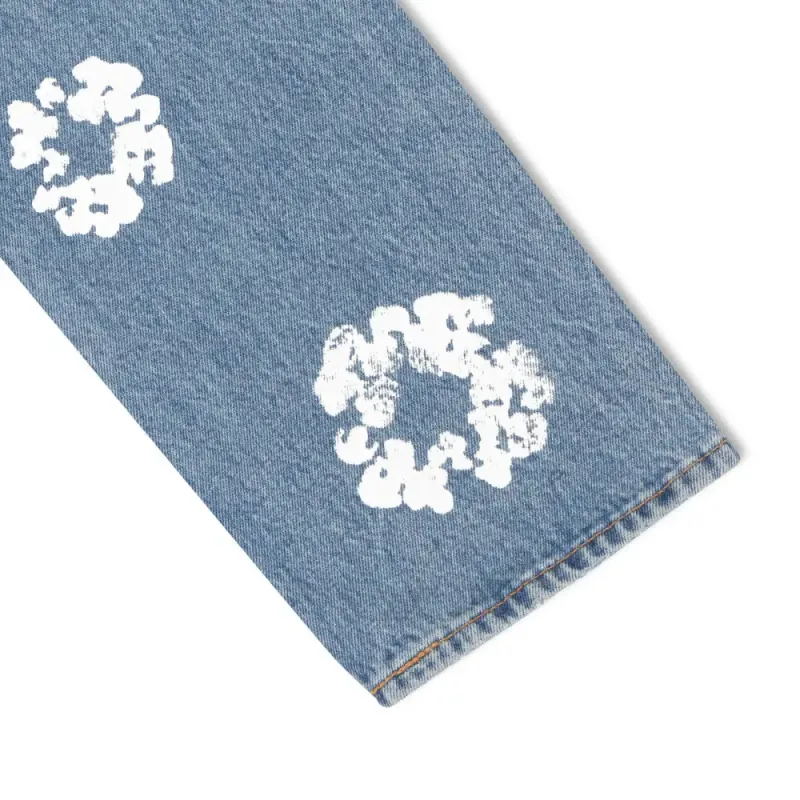 DENIM TEARS THE COTTON WREATH JEAN LIGHT WASH