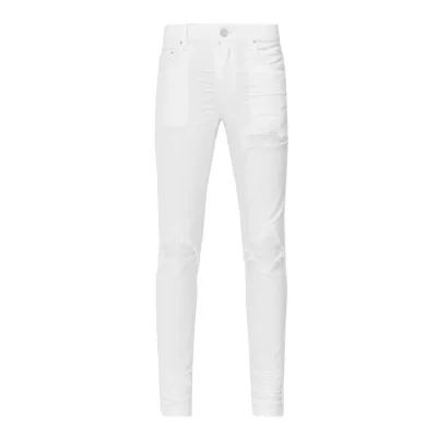 AMIRI White MX1 Jeans Distressing Throughout Skinny-fit Stretch Denim Jeans 01