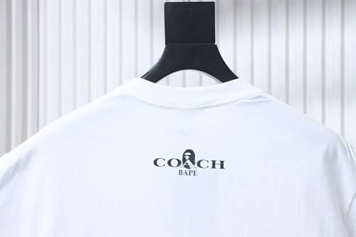 Bape × Coach Dinosaur and Ape-man Head Print T-Shirt White
