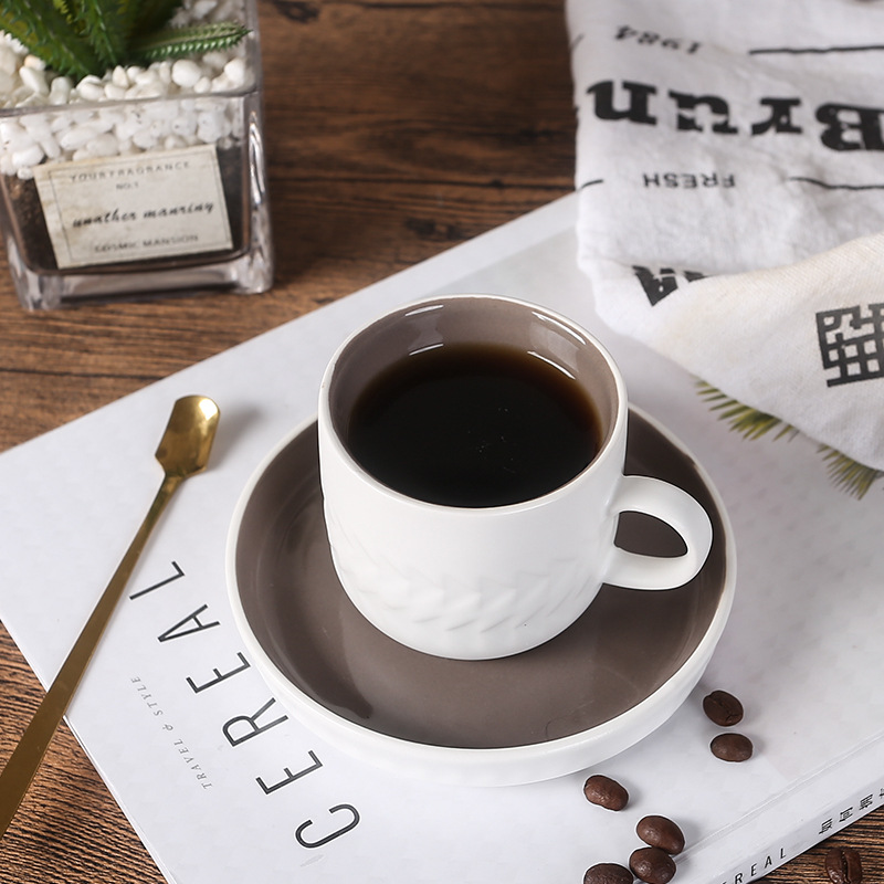 Vintage ceramic Nordic i coffee cup and saucer set, perfect for office tea drinking