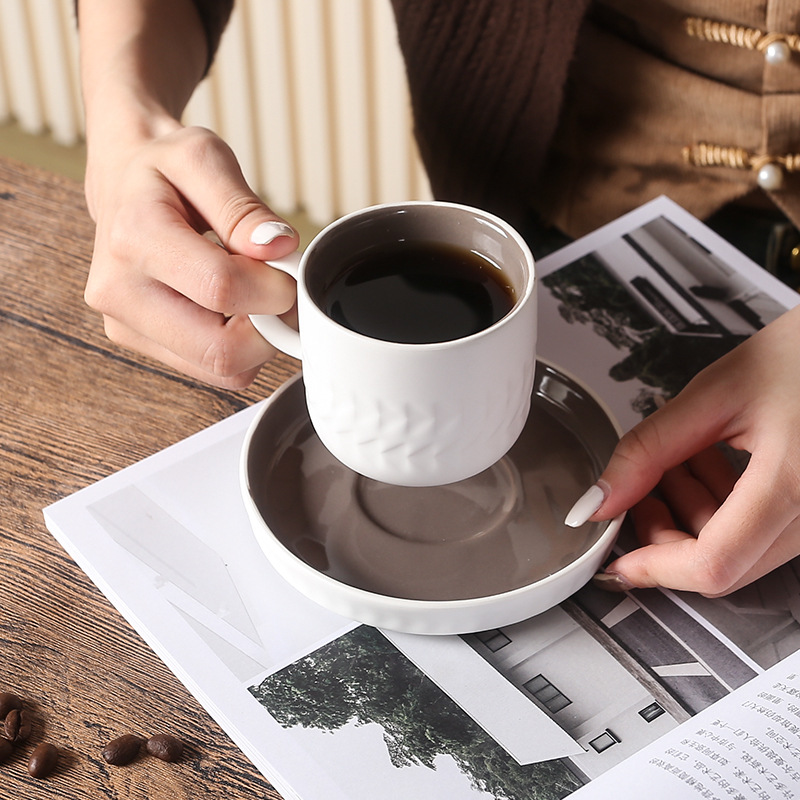 Vintage ceramic Nordic i coffee cup and saucer set, perfect for office tea drinking