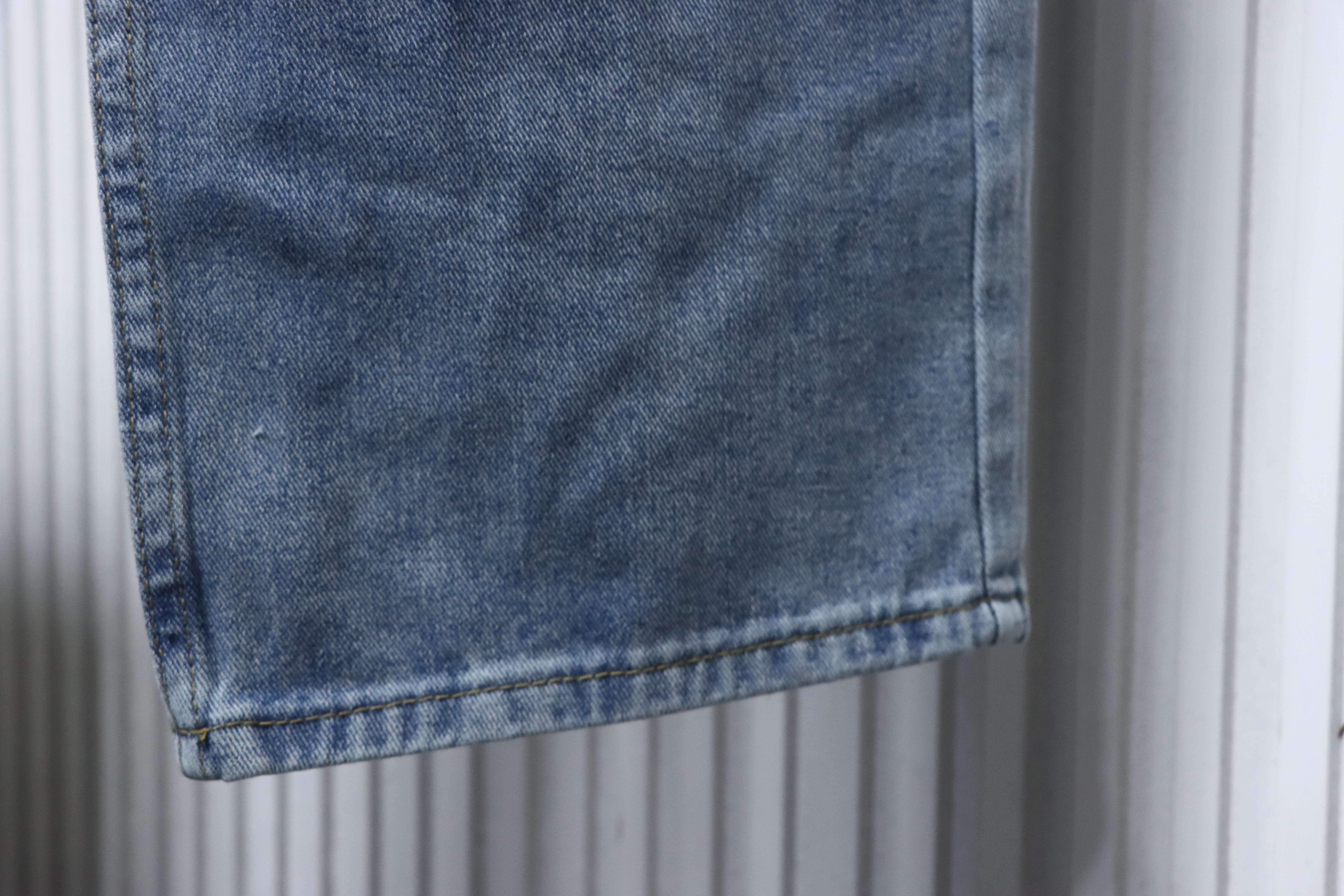 DIOR Distressed Patchwork Wide Leg Jeans