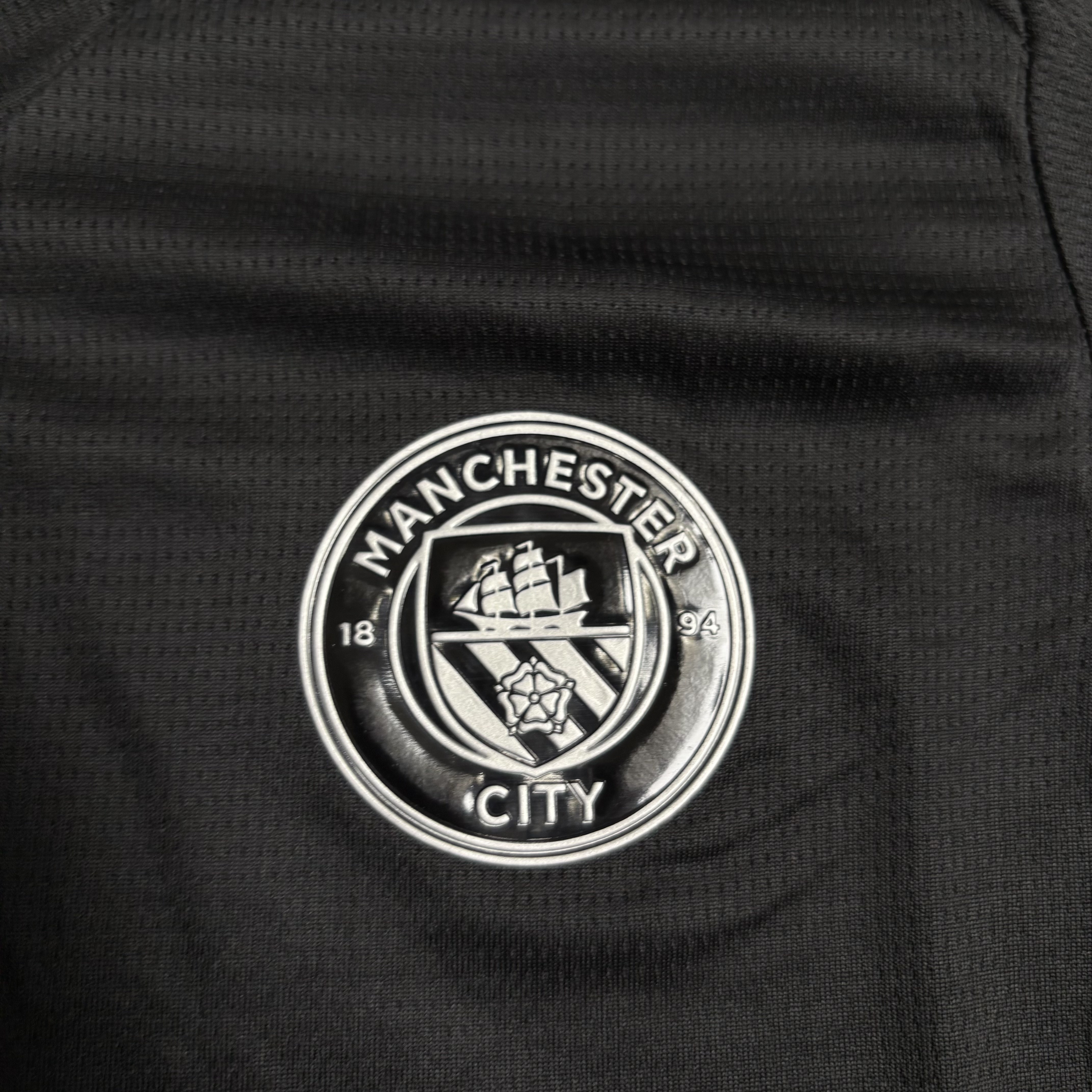 Manchester City 24/25 Kids Short Sleeve Black Jersey