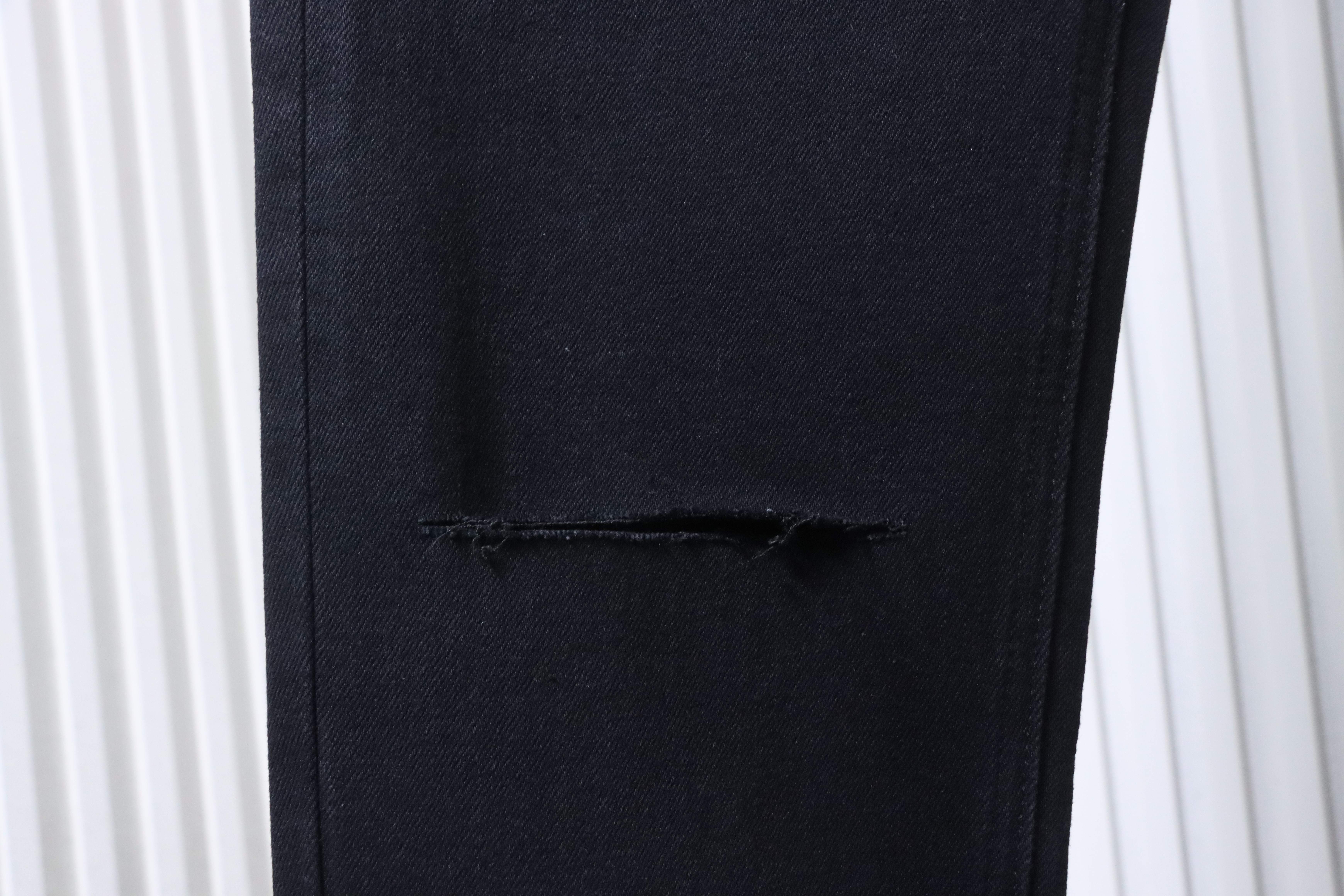 Ksubi Slashed Knee Jeans