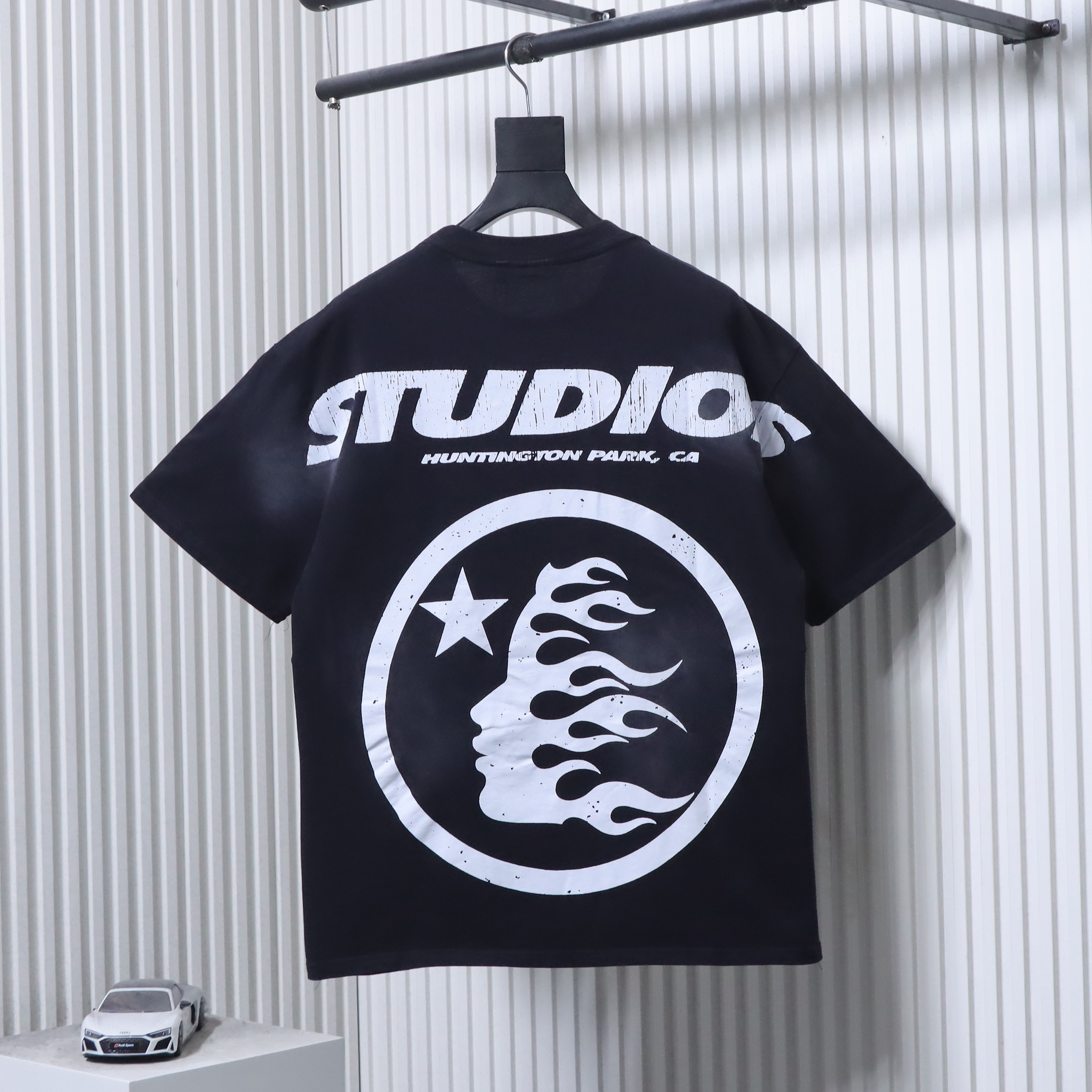 Hellstar Studios Cracked Logotype Flame Silhouette Star Graphic Tee Black h130