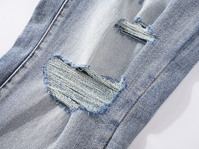 AMIRI AM323 Denim Jeans