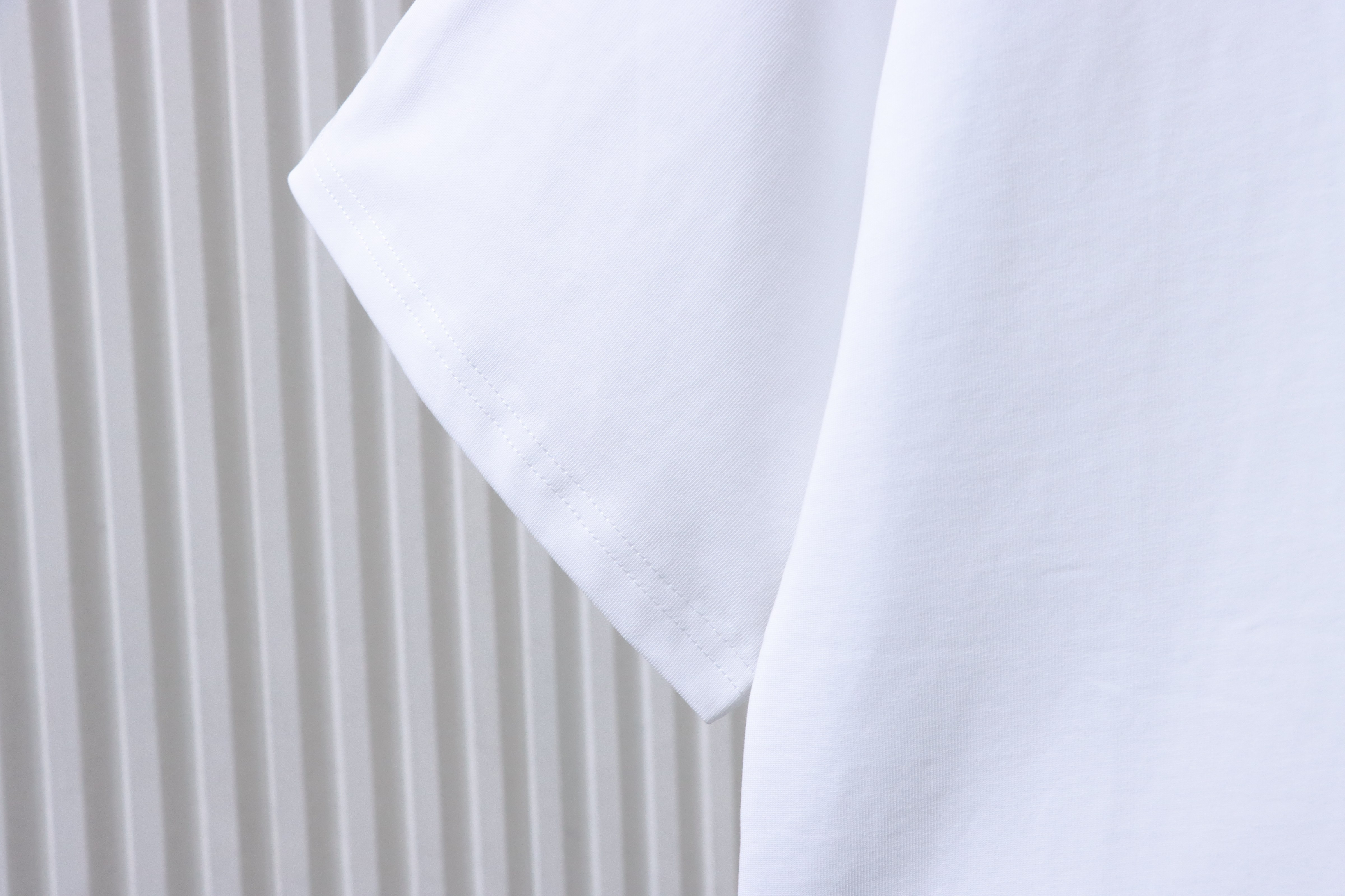 Balmain 26SS Minimal Rubberized Small Logo Short Sleeve T-Shirt