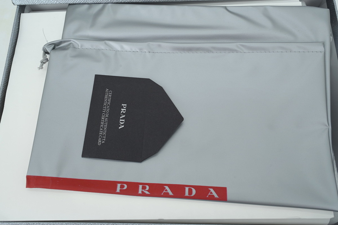Zapatillas Prada de goma, negro carbón